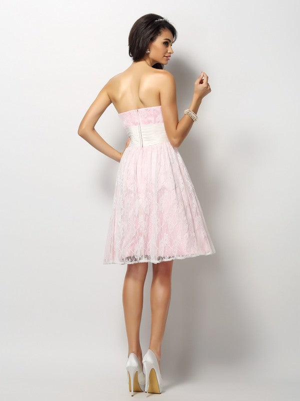 A-Line/Princess Sweetheart Lace Sleeveless Short Satin Bridesmaid Dresses CICIP0005571