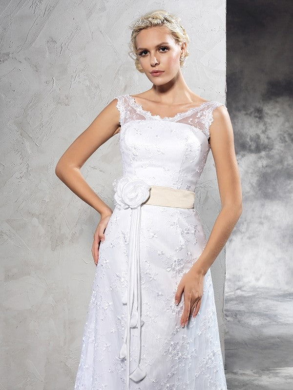 Sheath/Column Sheer Neck Hand-Made Flower Sleeveless Long Satin Wedding Dresses CICIP0006901